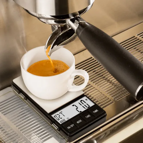 Joe Frex Digital Coffee Scales with Timer shown in use with an espresso machine
